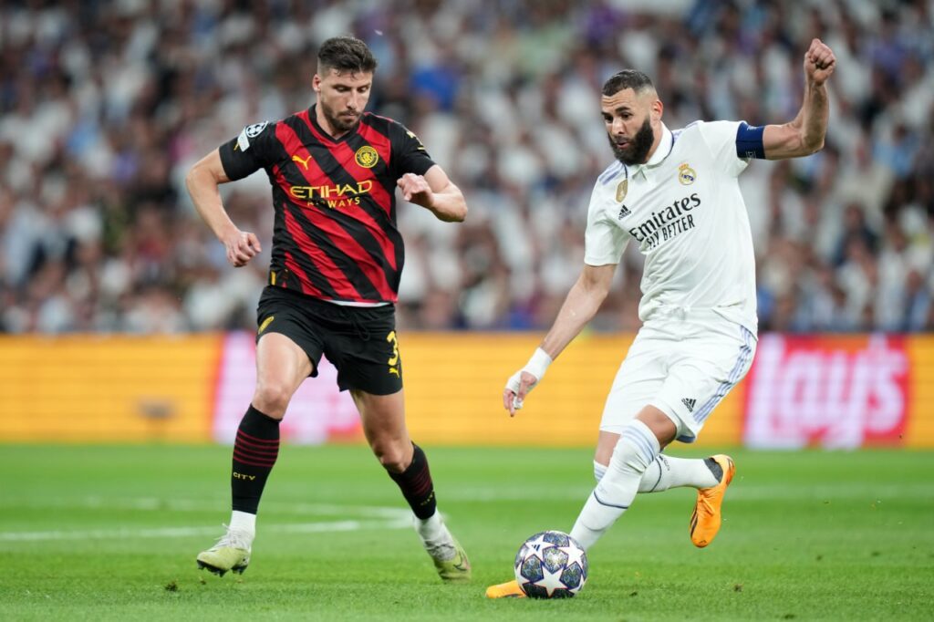 كريم بنزيما - روبن دياس - ريال مدريد ضد مانشستر سيتي (المصدر:Gettyimages)