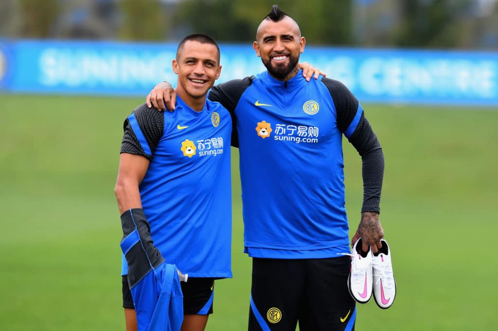 Alexis Sánchez con Arturo Vidal