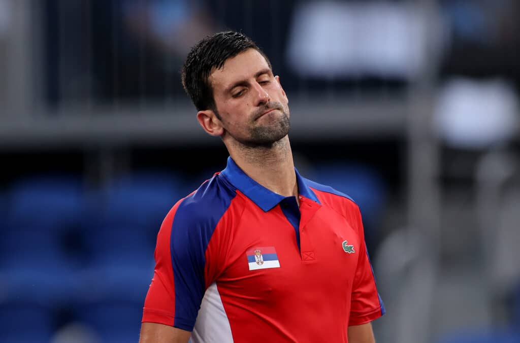 Novak Djokovic vs Carlos Alcaraz: el serbio ha ganado todos los titulos en el circuito ATP, pero nunca ha podido colgarse la medalla dorada en un Juego Olímpico¿Lo logrará en París?(Photo by Clive Brunskill/Getty Images)