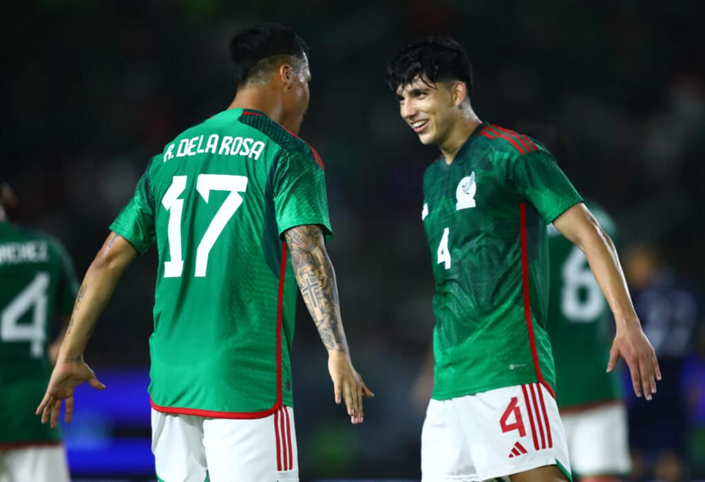 Roberto de la Rosa of Mexico celebrates with teammate Kevin Álvarez méxico