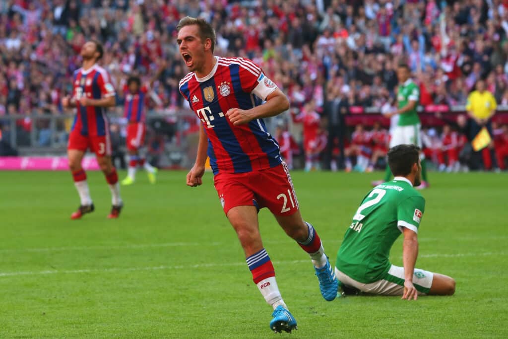 Phillip Lahm in Bayern Munich gear, celebrated for a remarkable season with zero fouls.