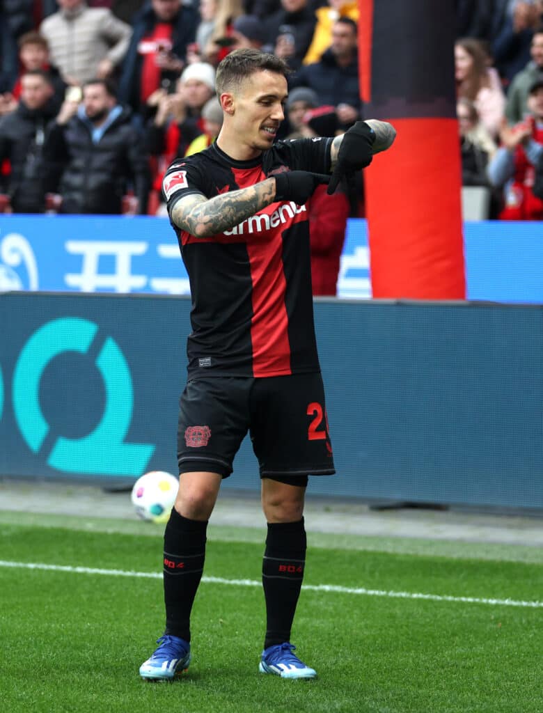 LEVERKUSEN, GERMANY - NOVEMBER 12: Alex Grimaldo of Bayer Leverkusen celebrates after scoring the team's first goal during the Bundesliga match between Bayer 04 Leverkusen and 1. FC Union Berlin at BayArena on November 12, 2023 in Leverkusen, Germany. 