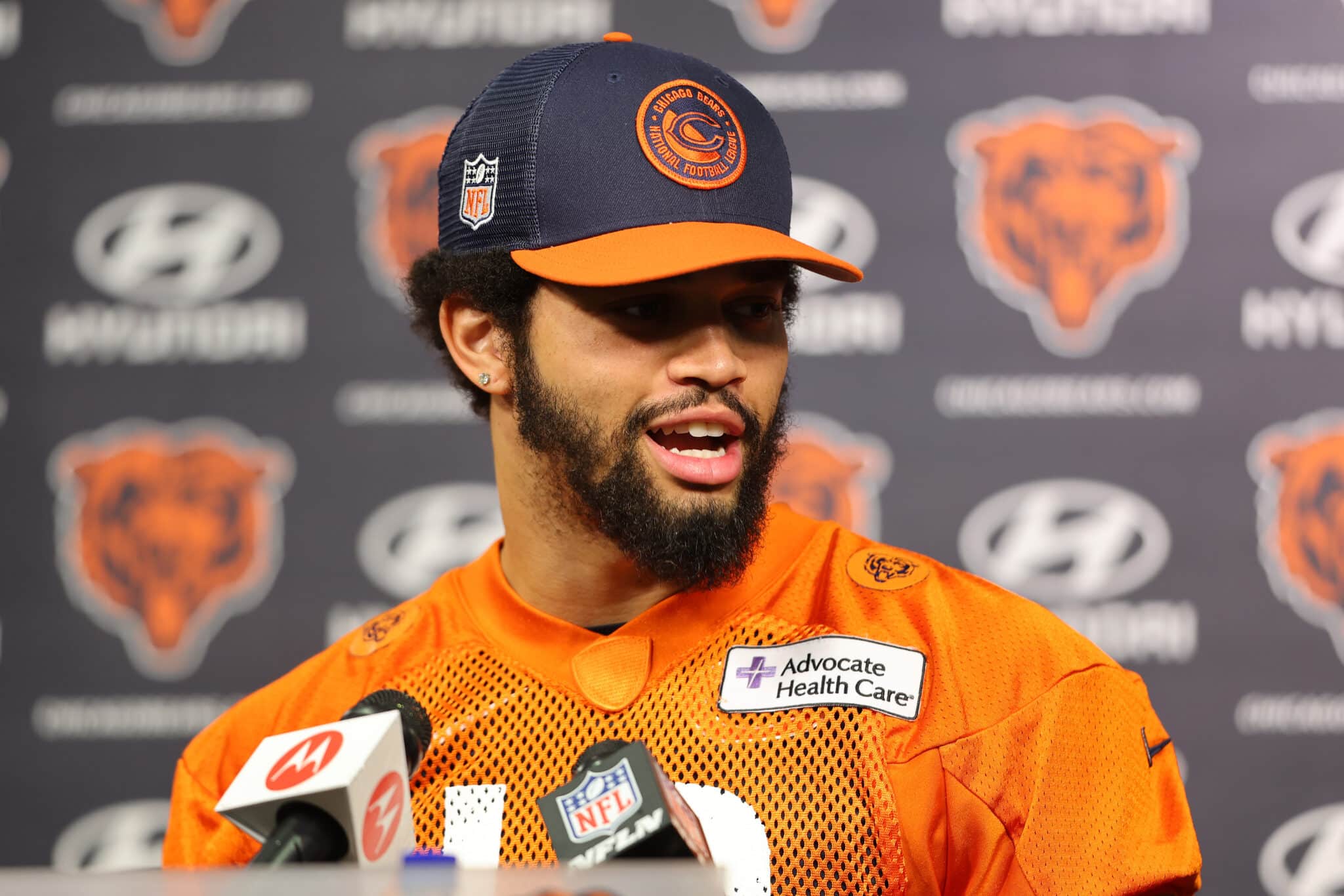 LAKE FOREST, ILLINOIS - MAY 10: Caleb Williams #18 of the Chicago Bears speaks to the media prior to Chicago Bears Rookie Minicamp at Halas Hall on May 10, 2024 in Lake Forest, Illinois.