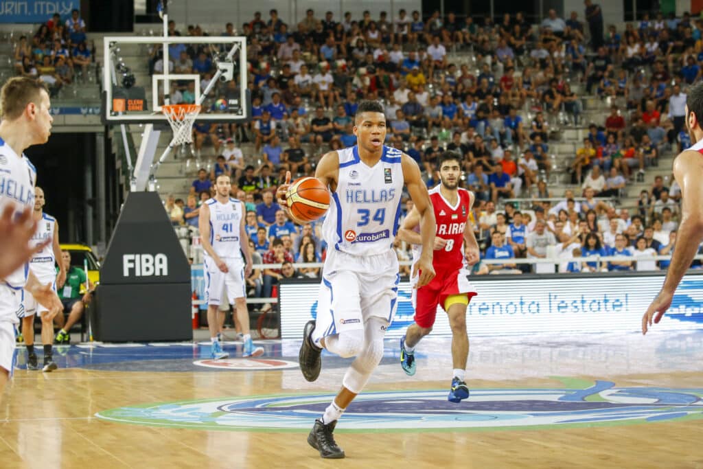 The greek small forward  Giannis Antetokounmpo  drives to the basket  in the match between Greece and Iran at 2016 FIBA Olympic Qualifying Tournament  in Turin, Italy 