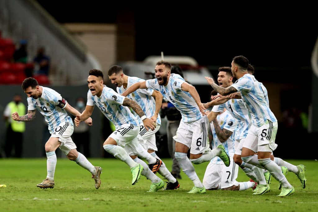 Argentina celebrating after winning a penalty shootout for the semi-final match between Argentina and Colombia in the 2021 Copa America