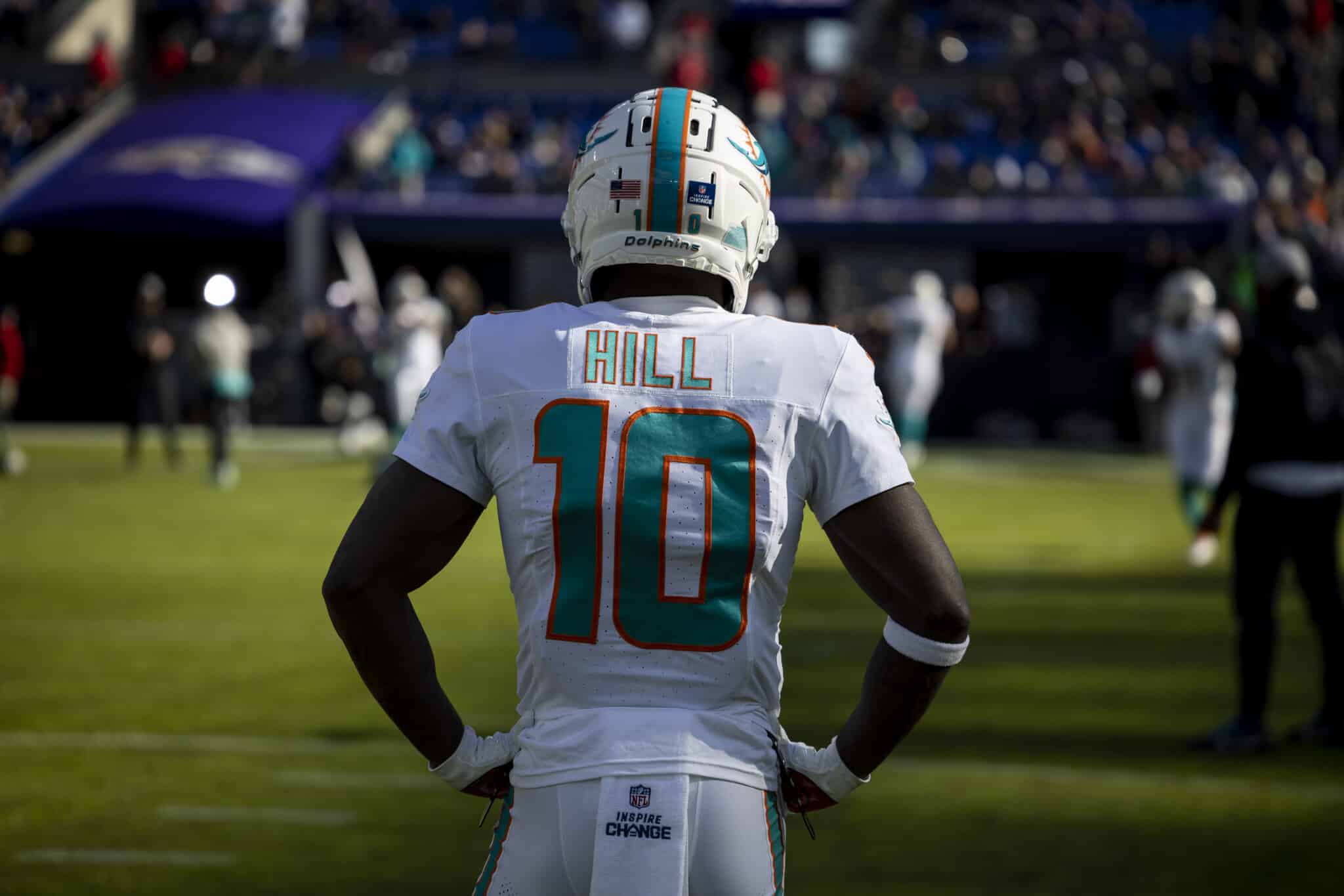 BALTIMORE, MARYLAND - DECEMBER 31: Tyreek Hill #10 of the Miami Dolphins looks on prior to an NFL football game between the Baltimore Ravens and the Miami Dolphins at M&T Bank Stadium on December 31, 2023 in Baltimore, Maryland.