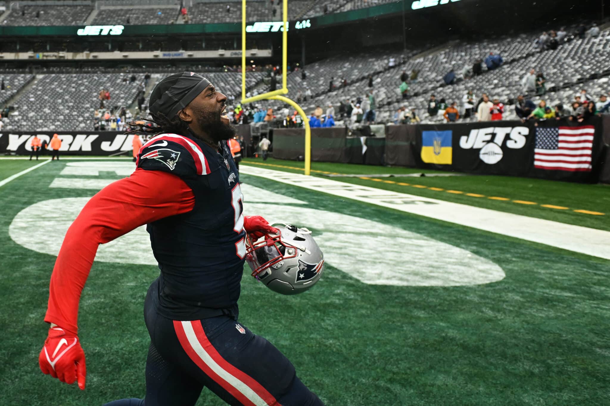 EAST RUTHERFORD, NJ - SEPTEMBER 24: Matthew Judon #9 of the New England Patriots runs off the field following the game against the New York Jets at MetLife Stadium on September 24, 2023 in East Rutherford, New Jersey.