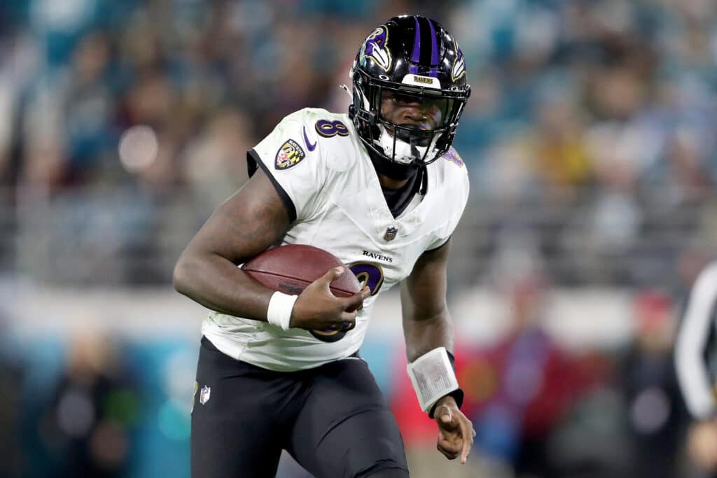 Lamar Jackson #8 of the Baltimore Ravens in action 