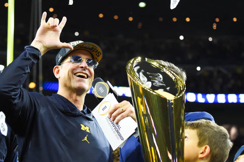 Jim Harbaugh celebrates winning the 2024 CFP National Championship game