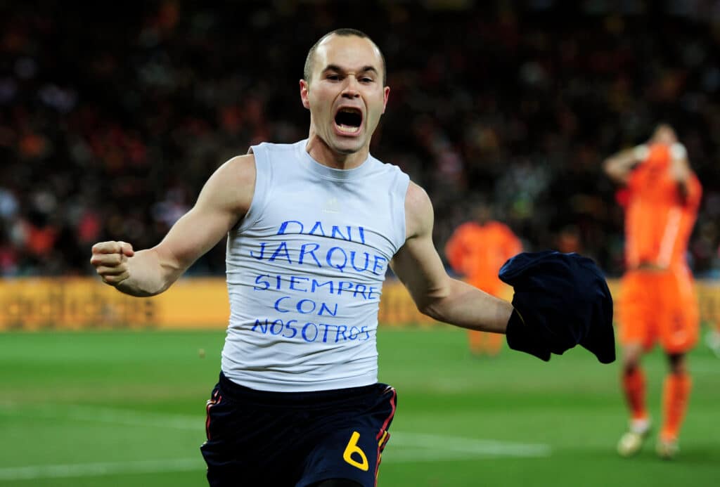 Andres Iniesta of Spain celebrates scoring his side's first goal during the 2010 FIFA World Cup South Africa Final 