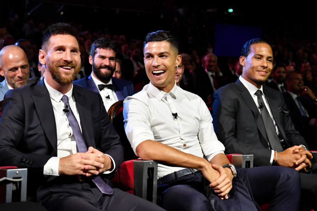 Cristiano Ronaldo of Juventus, Lionel Messi of FC Barcelona and Virgil Van Dijk of Liverpool react during the UEFA Champions League Draw