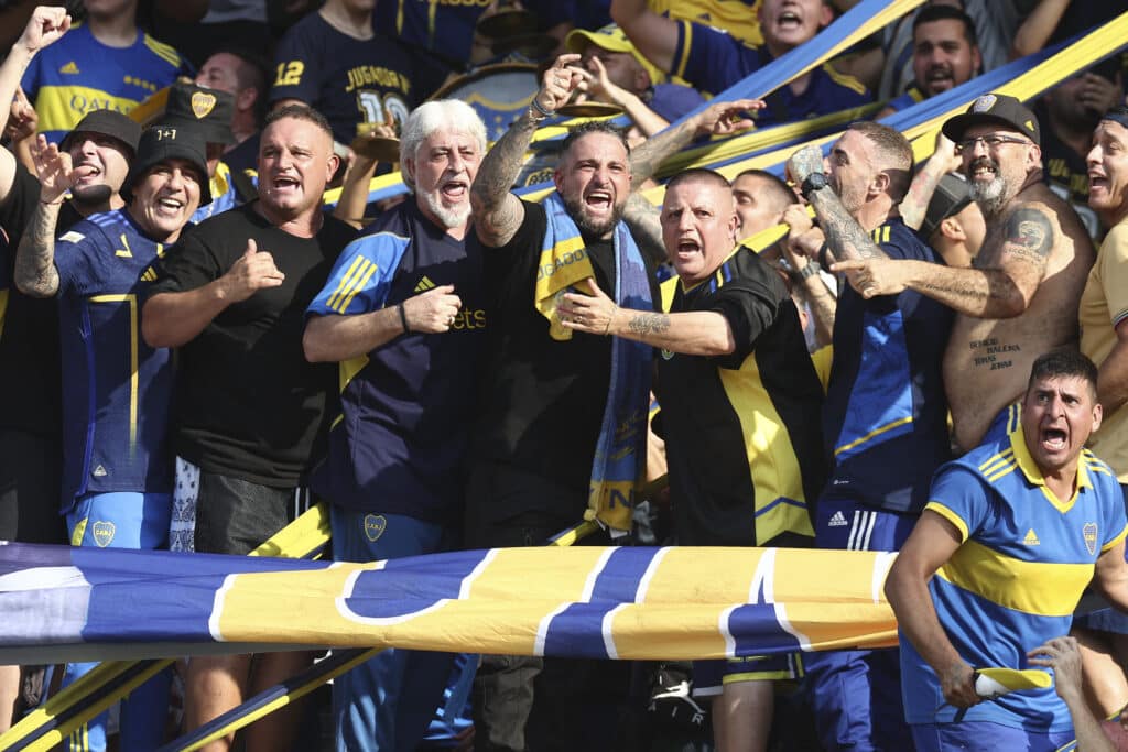 Boca Juniors' "Barra Brava" leaders Rafael di Zeo and Mauro Martin cheer for their team 