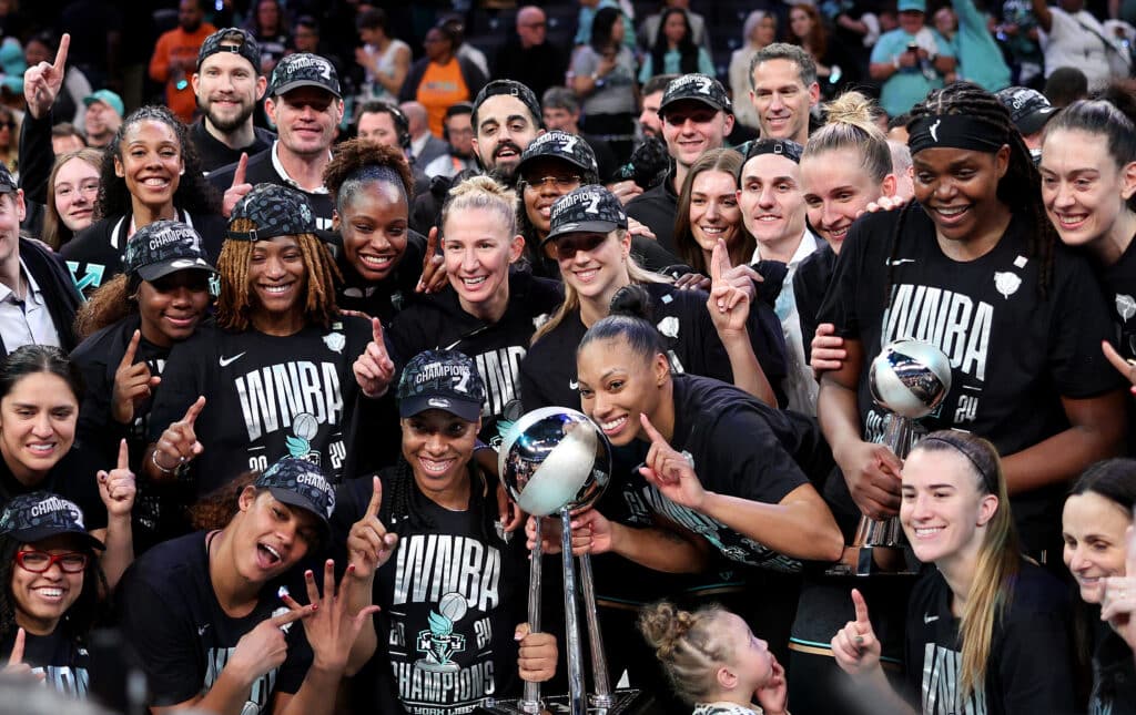  The New York Liberty pose after the win over Minnesota Lynx in Game Five of the WNBA Finals at Barclays Center 