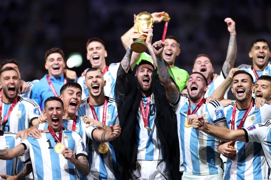 Lionel Messi of Argentina lifts the FIFA World Cup Qatar 2022 Winner's Trophy  