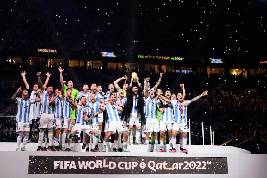 Lionel Messi of Argentinia celebrate with their FIFA World Cup Qatar 2022 trophy 