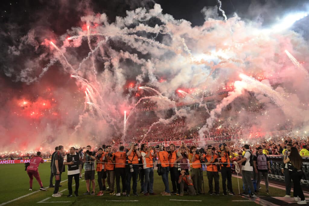 Fireworks explode before the Copa Libertadores semi-final second leg football match between Argentina's River Plate and Brazil's Atletico Mineiro at the Mas Monumental stadium in Buenos Aires on October 29, 2024.