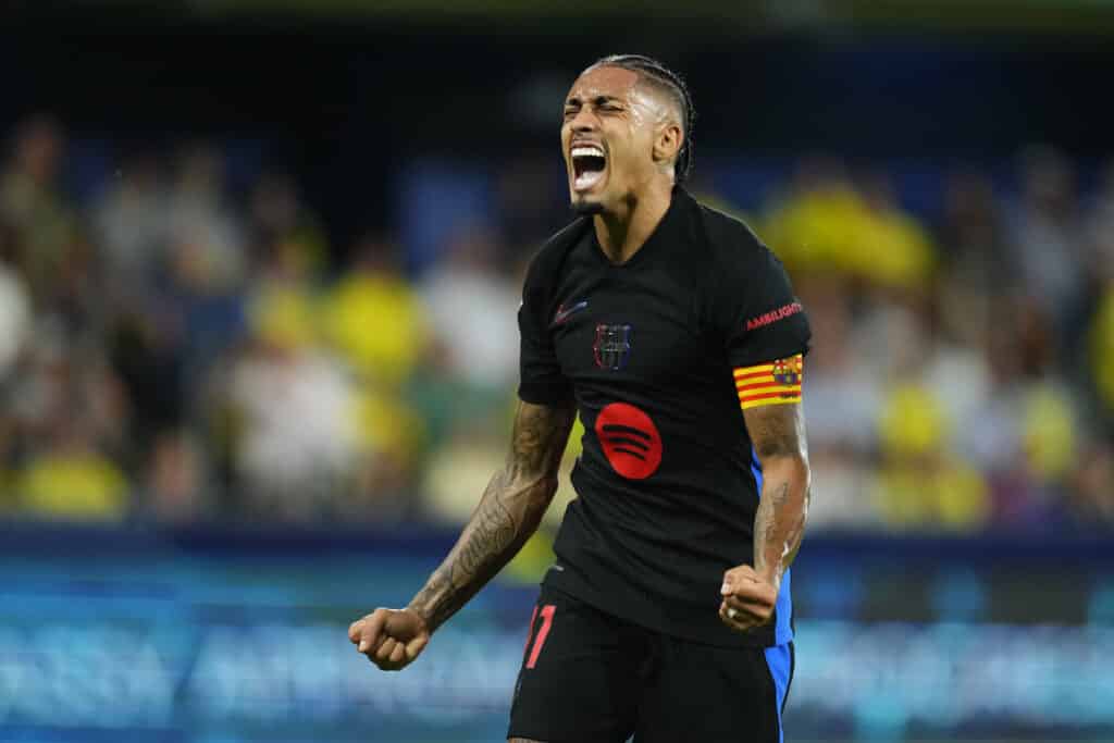 Raphinha right winger of Barcelona and Brazil celebrates after scoring his sides first goal during the LaLiga match between Villarreal CF and FC Barcelona  at Estadio de la Ceramica on September 22, 2024 in Villarreal, Spain. 